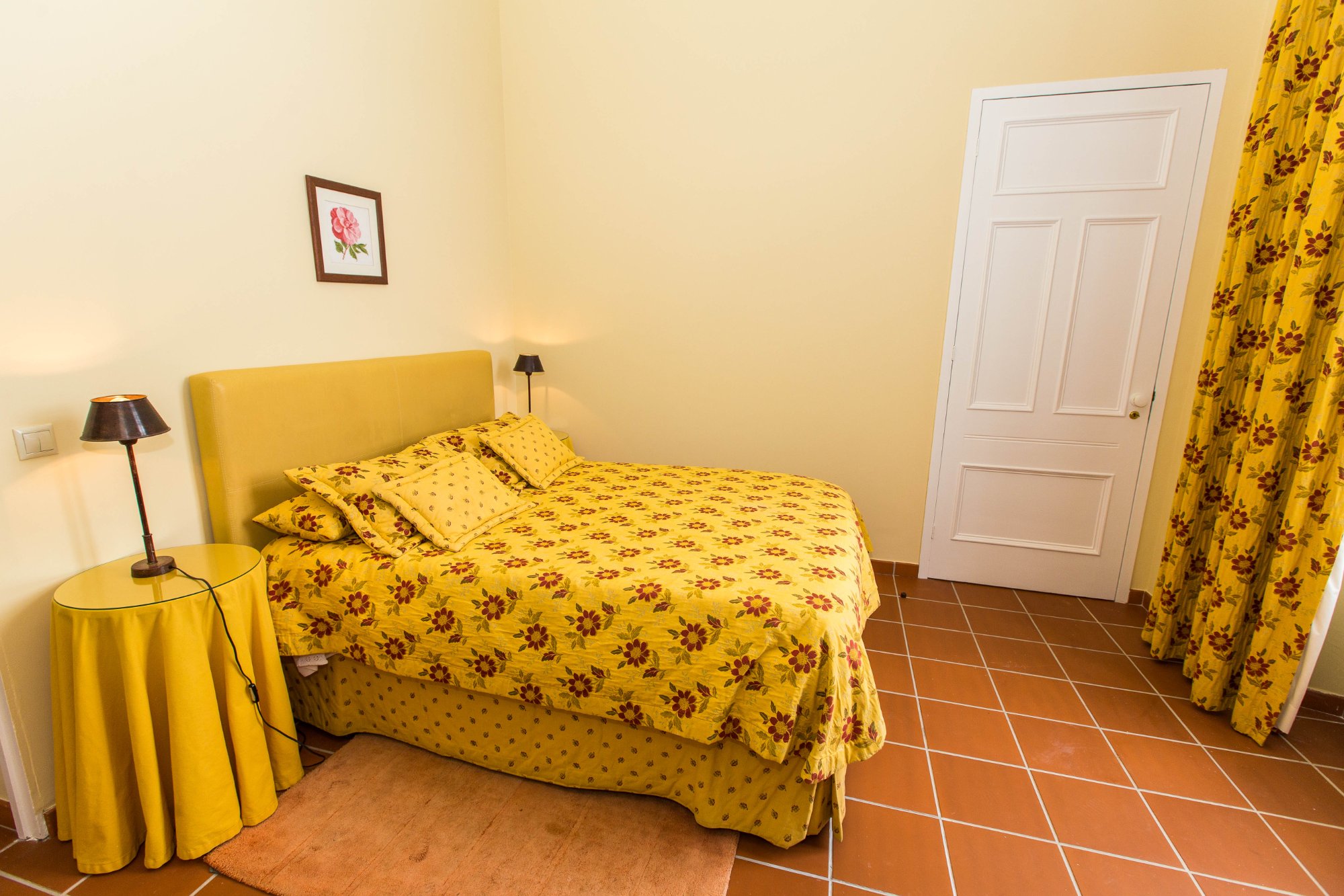 Bedroom interior with original terracotta floors