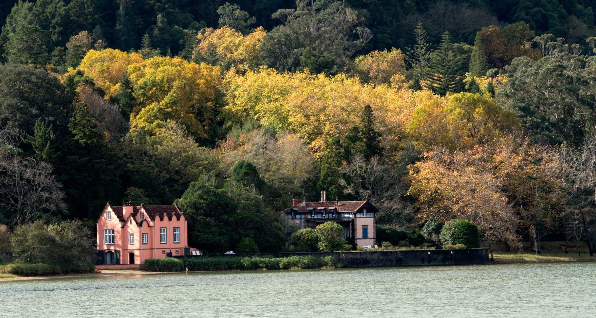 Autumn view of the estate from across the lake